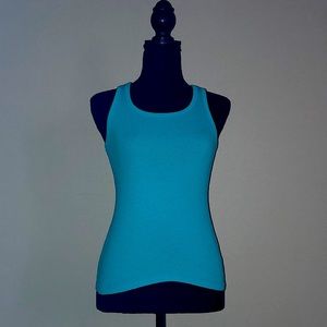 Slightly used blue tank top. Washed. May takr about a week to be shipped.